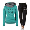 comfortabel trainingspak voor dames joggingpas met hart afgebeeld bestaande uit hoodie trui en broek dames