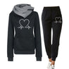 comfortabel trainingspak voor dames joggingpas met hart afgebeeld bestaande uit hoodie trui en broek dames