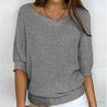 model draagt elegante gebreide dames sweater met halve mouwen voor de herfst en winter dames trui